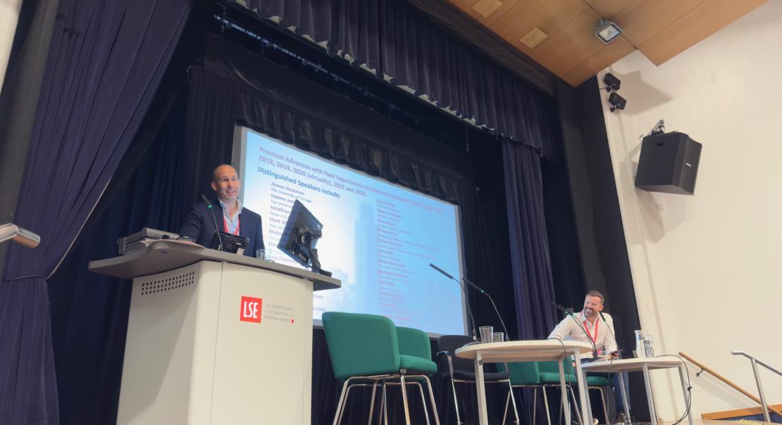 Woman presenting at podium at AFE Conference