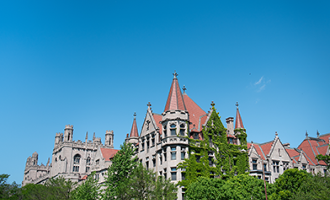 UChicago buildings with blue sky above
