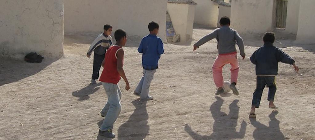 Children playing soccer